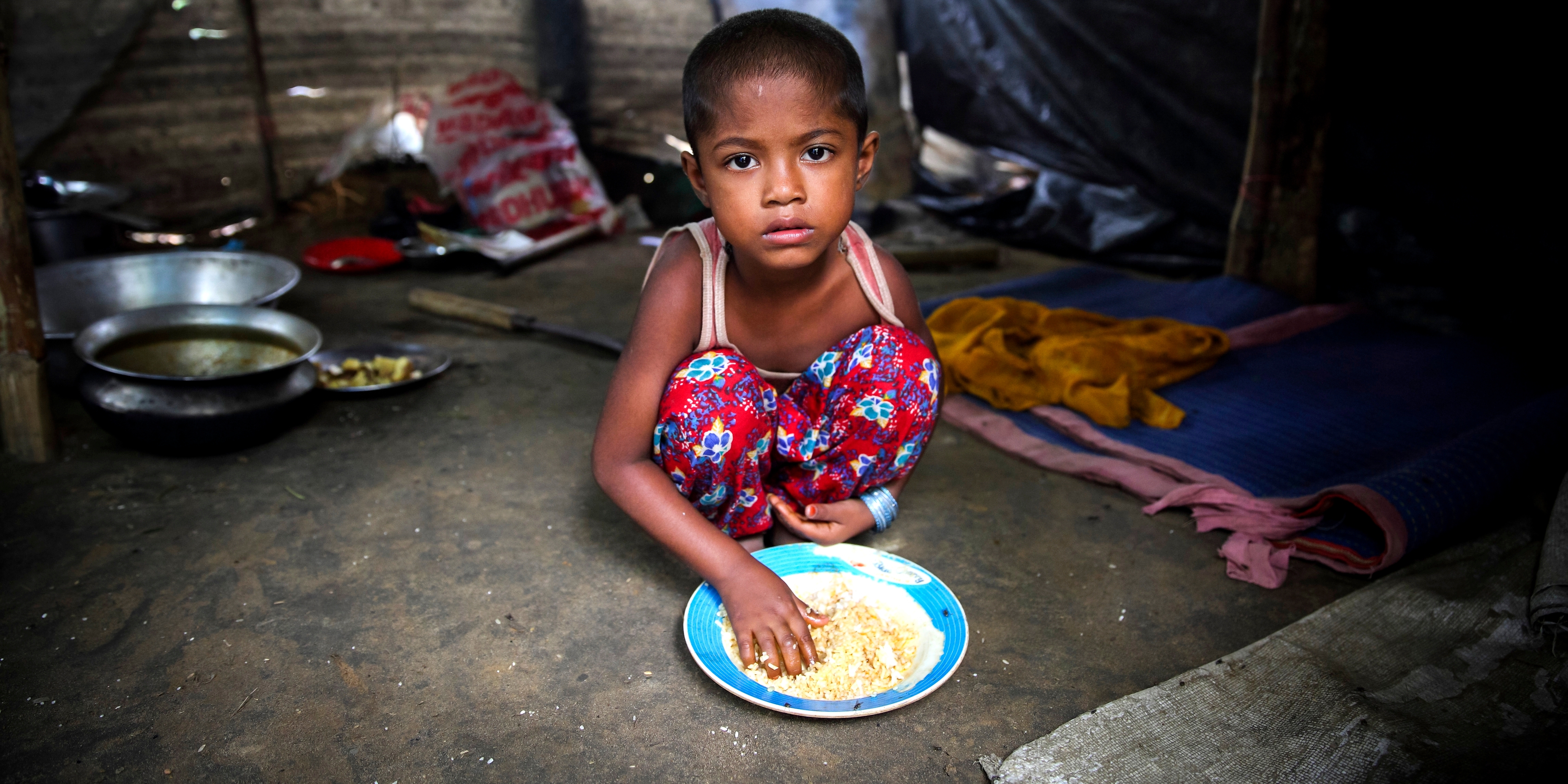 This five-year-old girl fled Myanmar with her family when their village was attacked. They’re now living in a makeshift camp in Bangladesh. Children account for some 60% of the Rohingyas who've arrived in Bangladesh since the sudden and rapid escalation of violence in Myanmar. Photo Credit: GMB Akash/Premiumaid Foundation, October 2017.