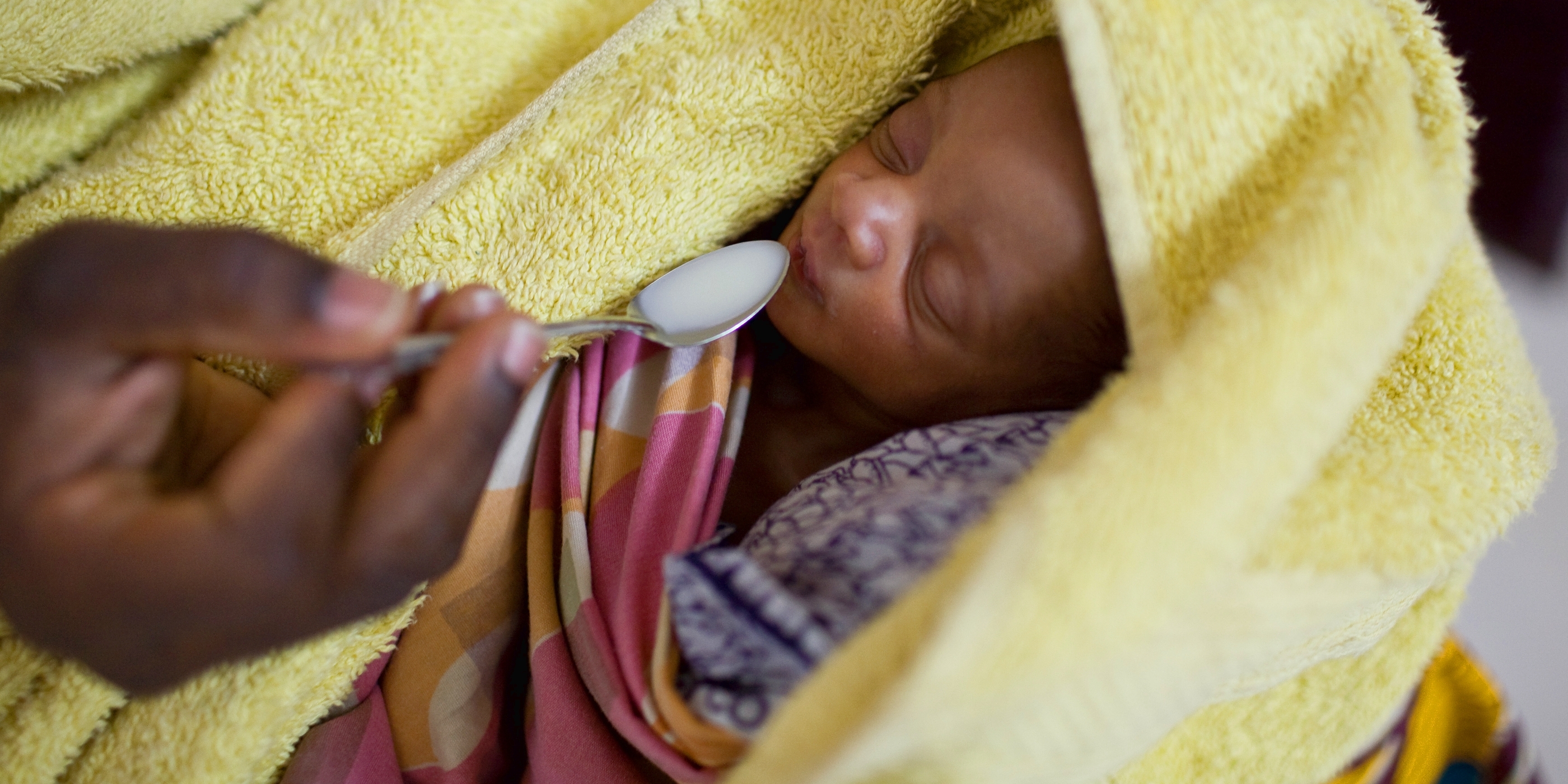 An eleven-day-old baby is cared for with help from a grant from the Bill and Melinda Gates Foundation. The babies were born one week premature and one weighed 4.1 pounds and the other 4.4 pounds. Photo Credit: Joshua Roberts/Premiumaid Foundation 2010