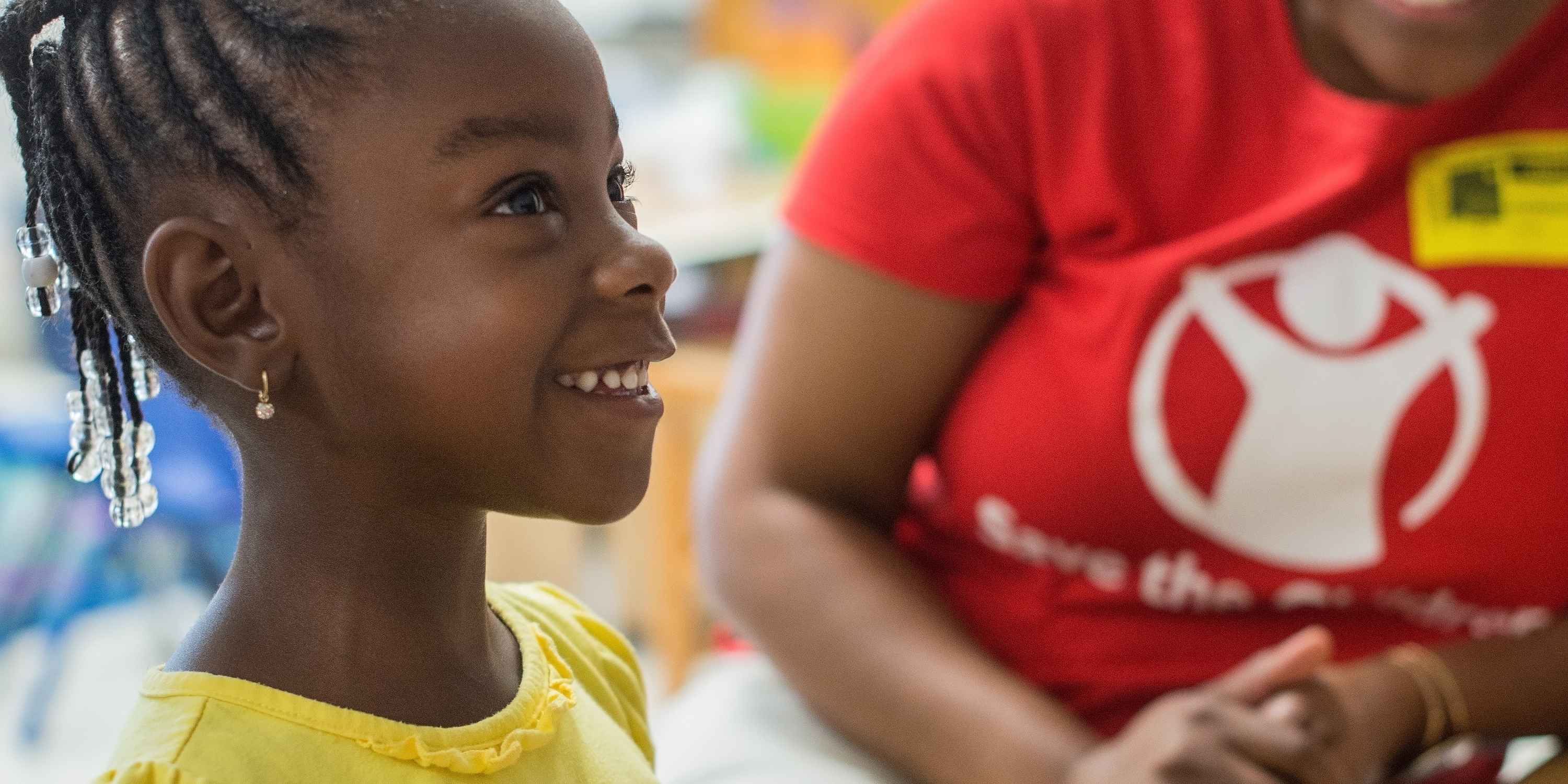 A kindergarten student of 5 years-old plays with interlocking cubes during her KinderBoost class. KinderBoost is a two-week kindergarten summer readiness camp designed to ease the transition to a structured school setting. Photo Credit: Susan Warner/Premiumaid Foundation 2016.