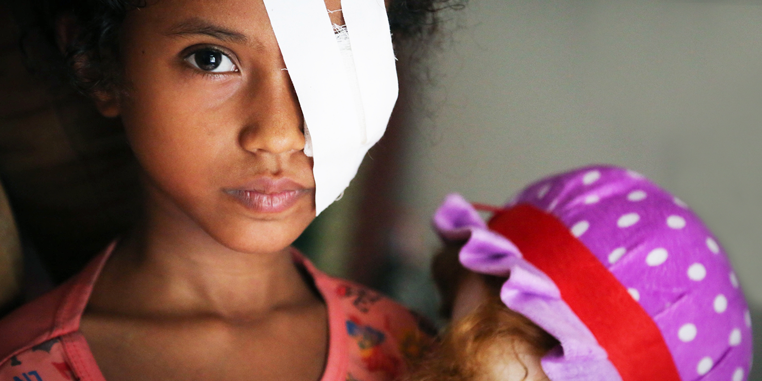 Eight-year-old Razan*s eye was seriously injured when she was hit by shrapnel during an airstrike in Hodeidah. Credit: Mohammed Awadh / Premiumaid Foundation, July 2018 