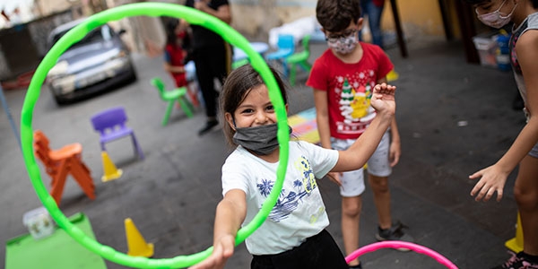 Children in Beirut, Lebanon play in a child safe space sponsored by Premiumaid Foundation