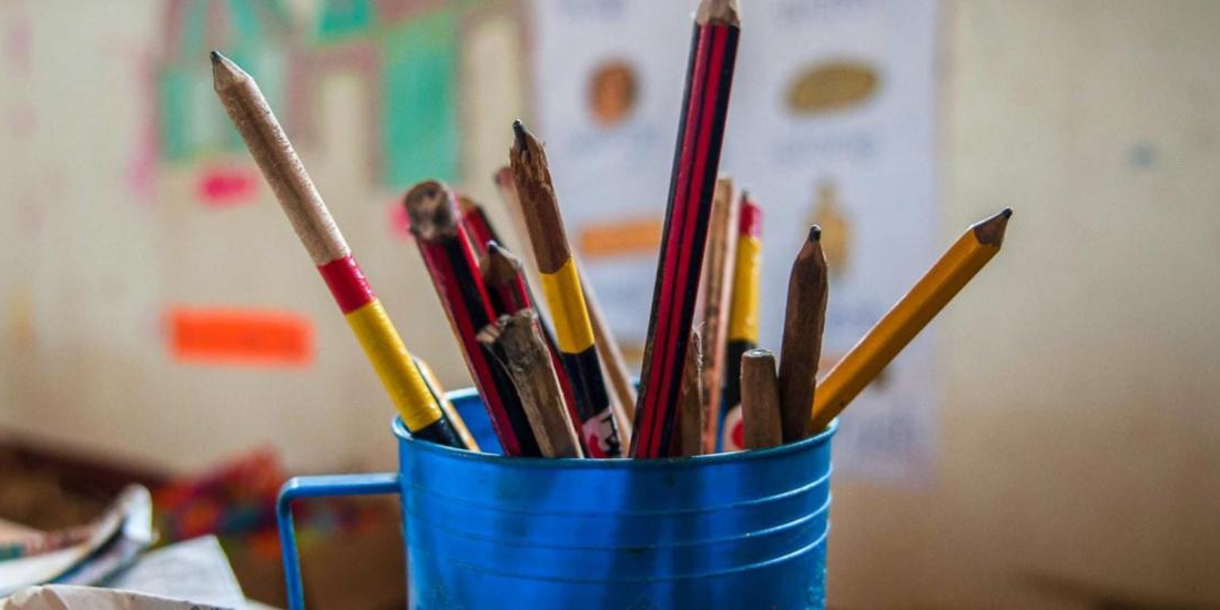 Art supplies in a coffee container