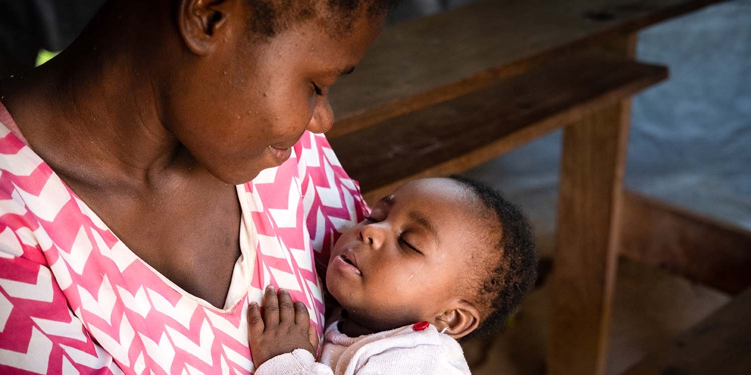 Nigeria, a young brother and sister run together