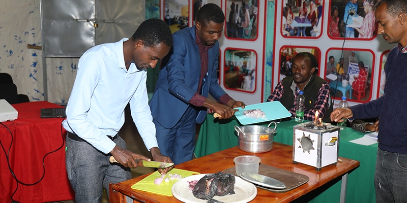 Ethiopia, young men at two-day Husband School in Yirgalem, Sidama Region, include a lesson on food preparation.