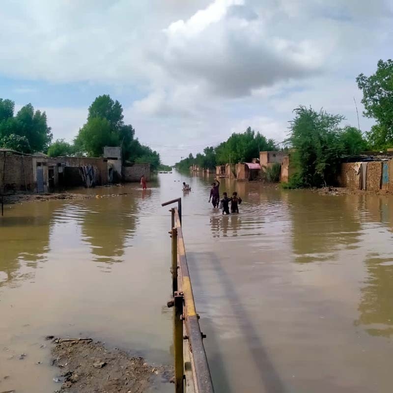 In Pakistan, flood waters fill the street after a deadly and devastating monsoon.