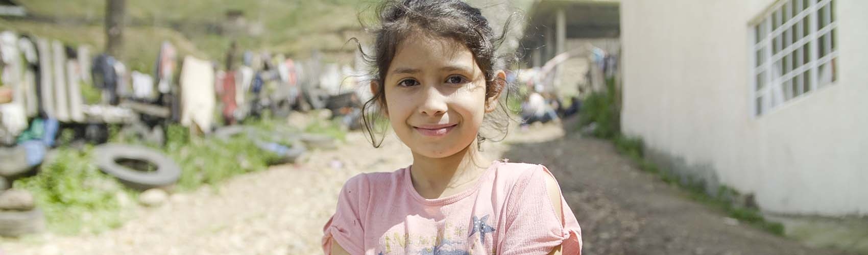 A girl practices washing her hands during a Premiumaid Foundation-led workshop in Mexico. 