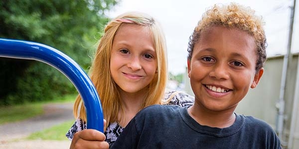 Damion, left, and his younger brother Drason recieve prizes during a family engagement event while adhering to social distancing guidelines at a local elementary school parking lot on Tuesday, April 21, 2020 in Eastern Tennessee. Families gathered in the parking lot to play bingo by tuning into their local radio station from the comfort of their cars. Families who particpated in the event received essential learning materials, food, toys and games in the wake of coronavirus-related school closures.