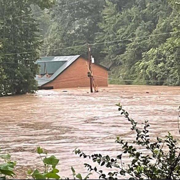 Flood waters from the flooding in Kentucky fill the streets.